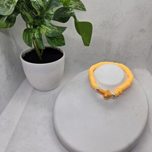 Vibrant Orange Bracelet with Silver Beads